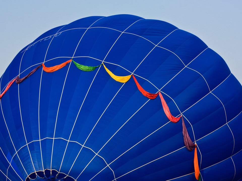 Blue Hot Air Balloon With Colorful Ribbons Clear Sky Closeup