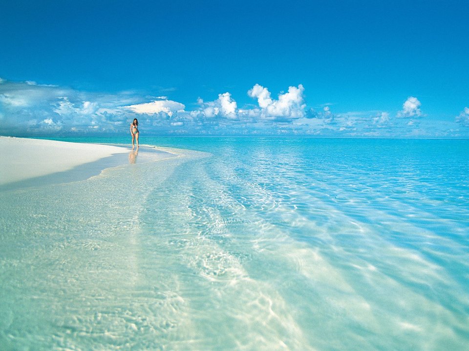 Beachside Stroll On Tropical White Sand Beach