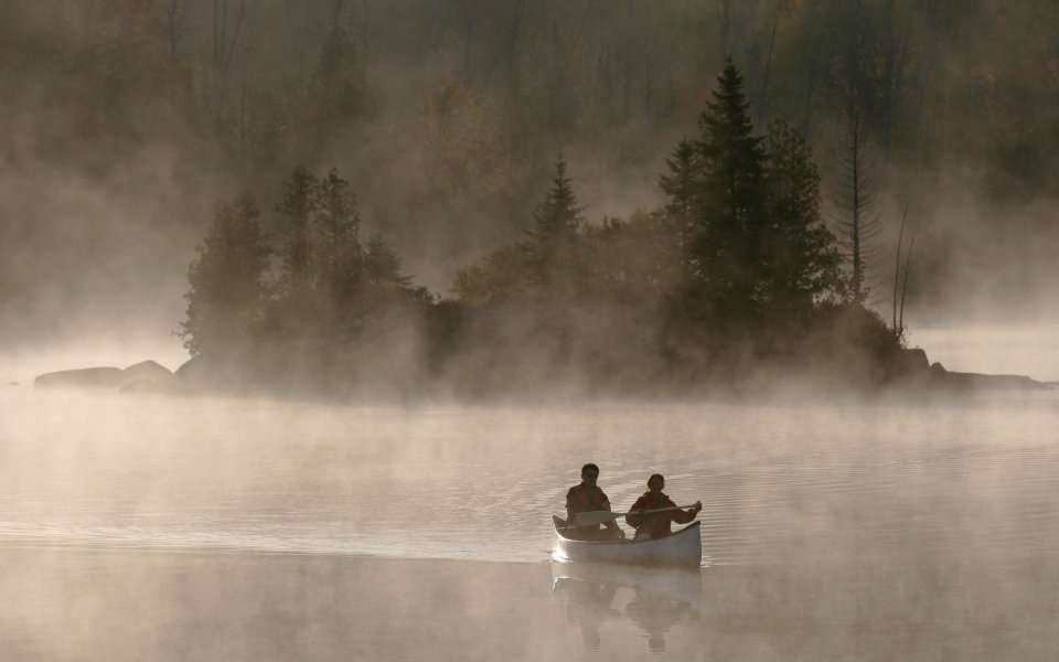 Canoeing At Dawn Foggy Lake Natural Landscape