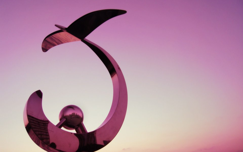 Abstract Metal Sculpture At Sunset