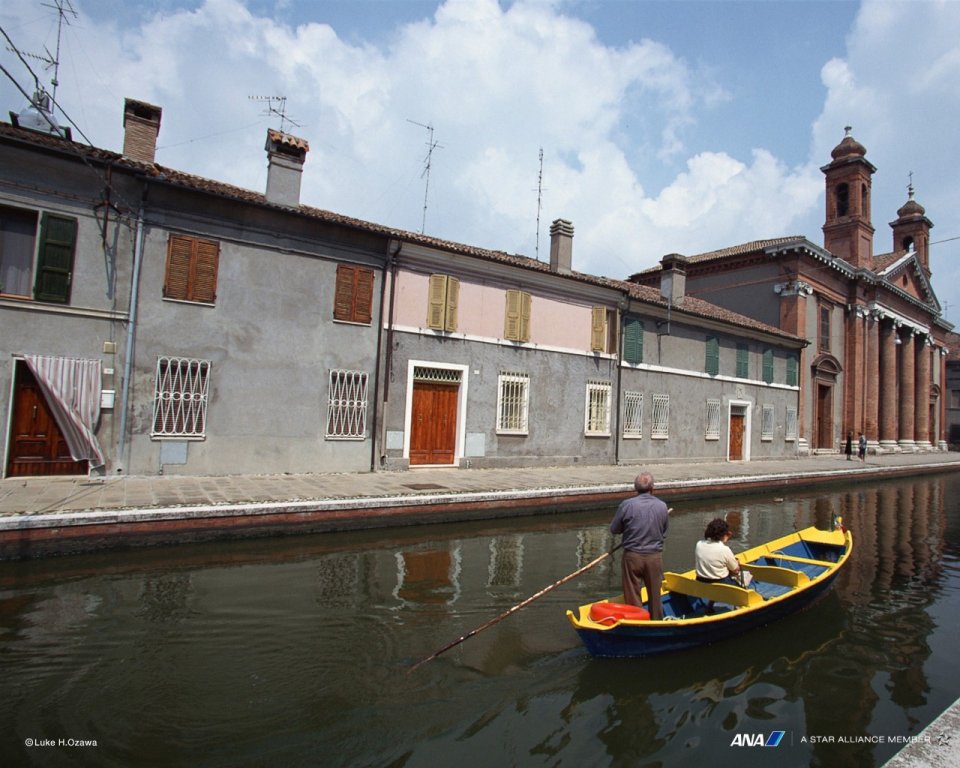 Italian Canal Scenery With Traditional Boat
