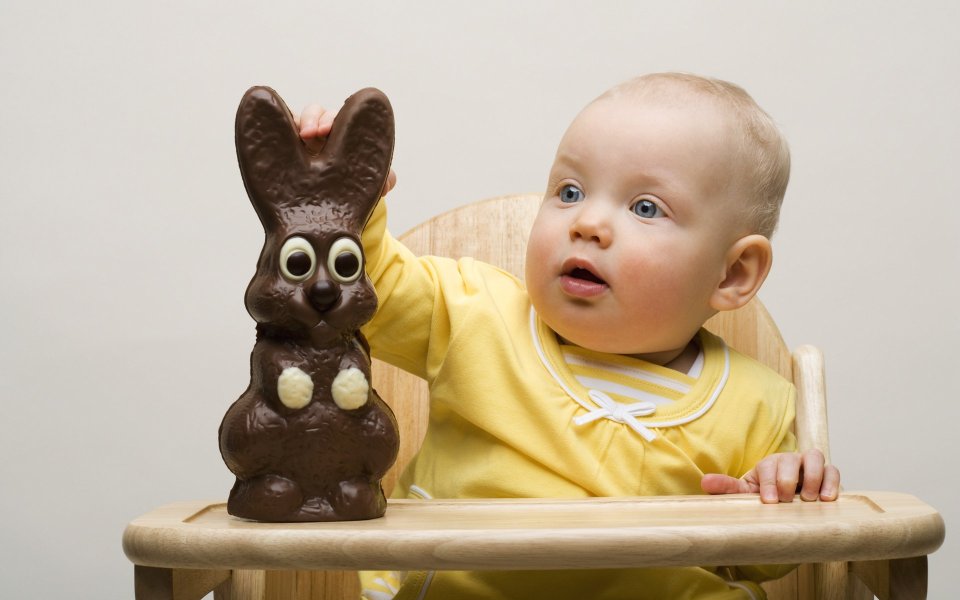 Cute Baby Touching Easter Chocolate Bunny Photography