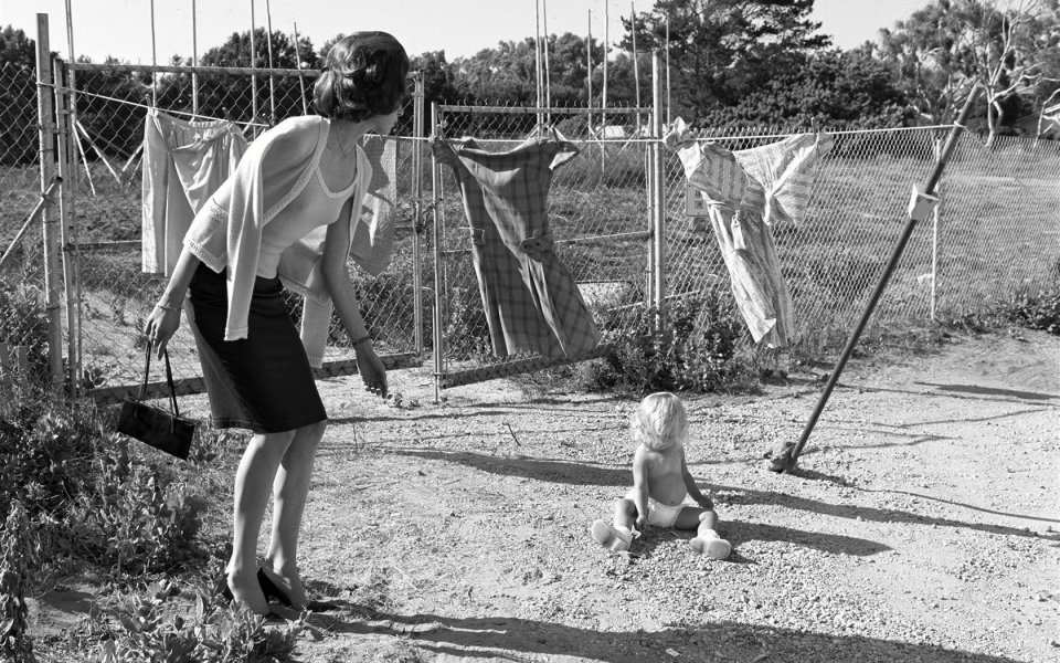 Vintage Black And White Photo Elegant Woman Watching Toddler Outdoor