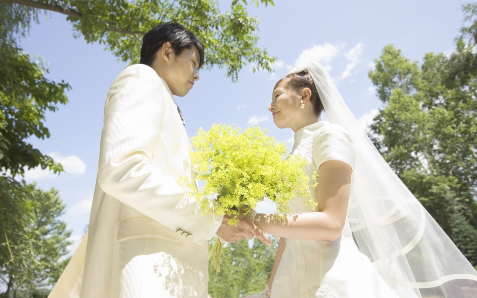 Garden Wedding Photo Bride Groom Holding Yellow Bouquet Together