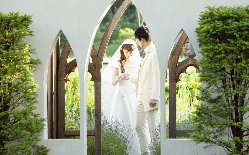 Romantic Garden Wedding Photo Bride And Groom Holding Hands