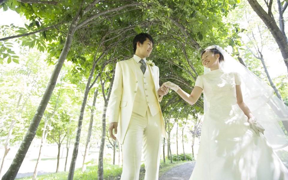 Romantic Garden Wedding Photo Of Newlyweds Under Tree Tunnel