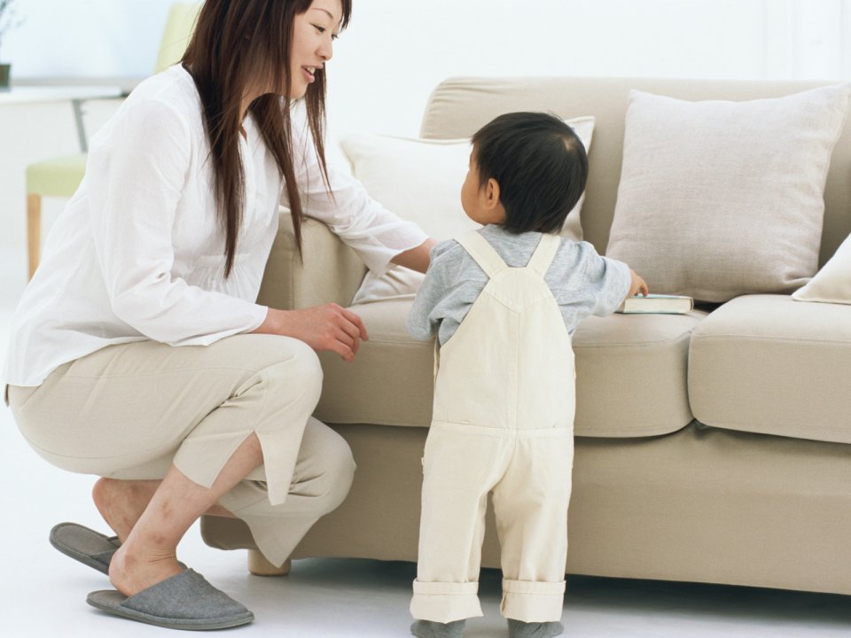 Warm Mother And Toddler Tender Interaction In Living Room