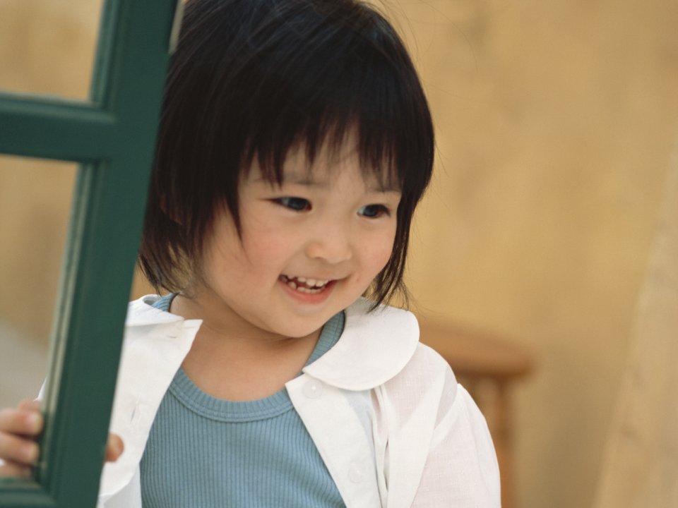 可爱缺牙小女孩暖调胶片人像写真