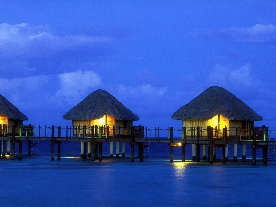 Manihi South Pacific Overwater Bungalows At Dusk