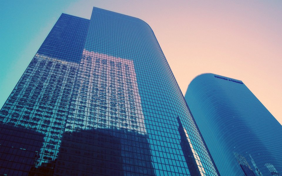 Modern City Skyscraper Glass Facade At Dusk