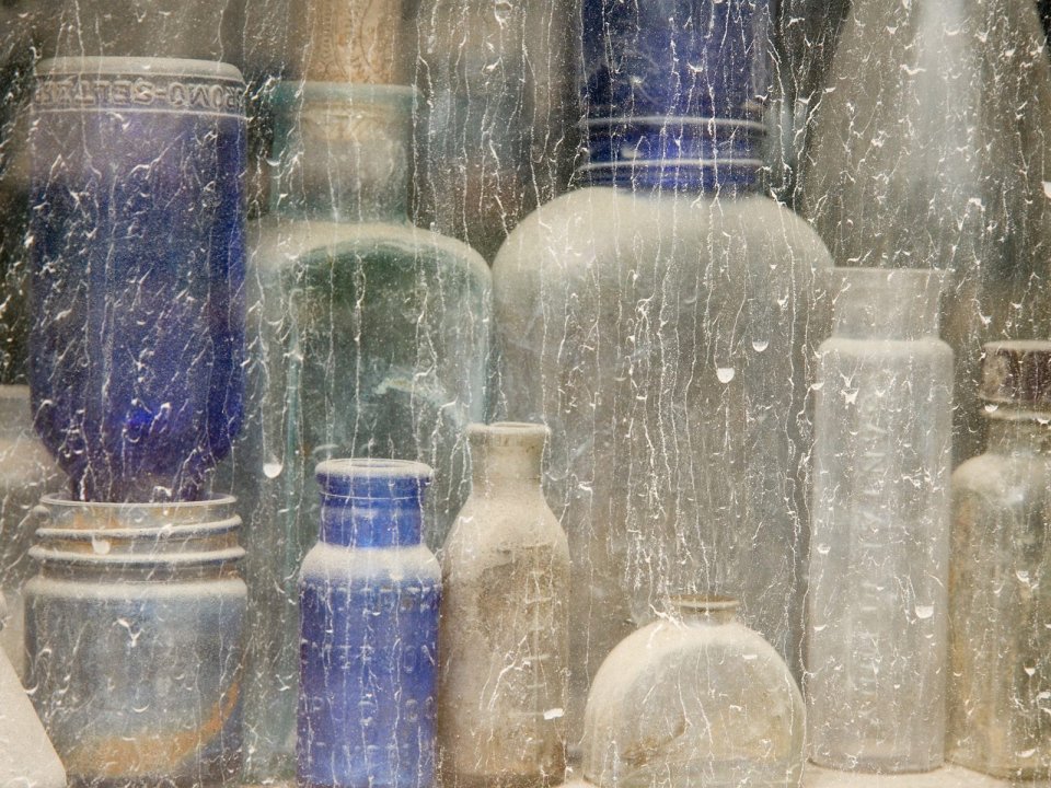 Old Bottles In Window Idaho City Still Life