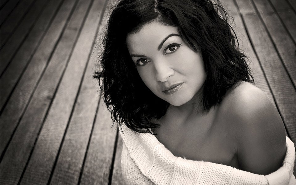 Black And White Portrait Of Elegant Curly Haired Mature Woman
