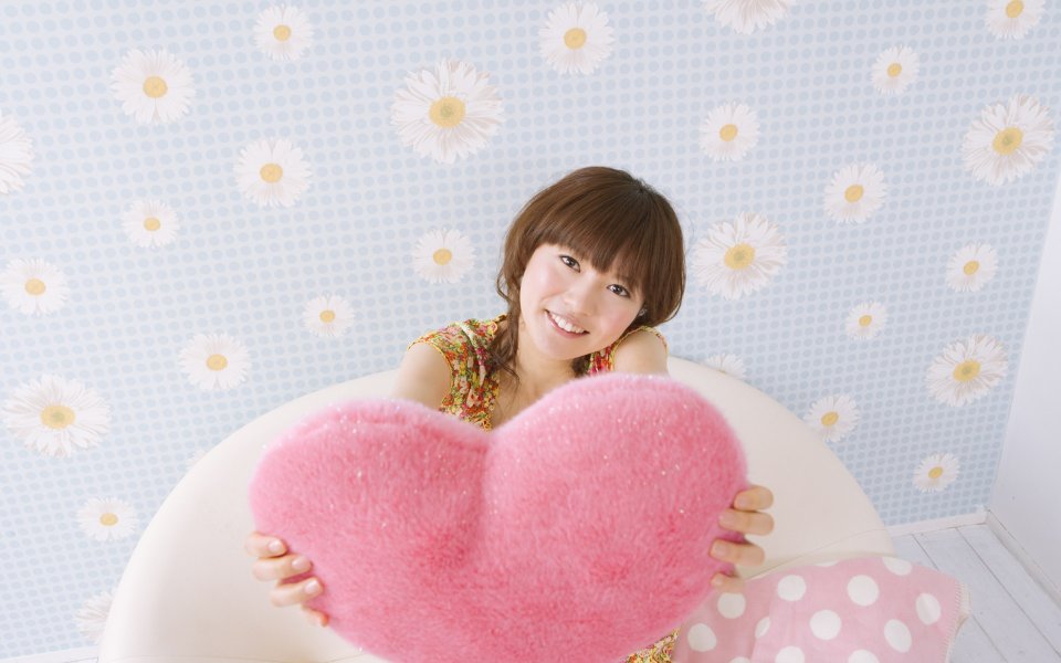 Sweet Young Girl Holding Pink Heart Pillow Home Portrait