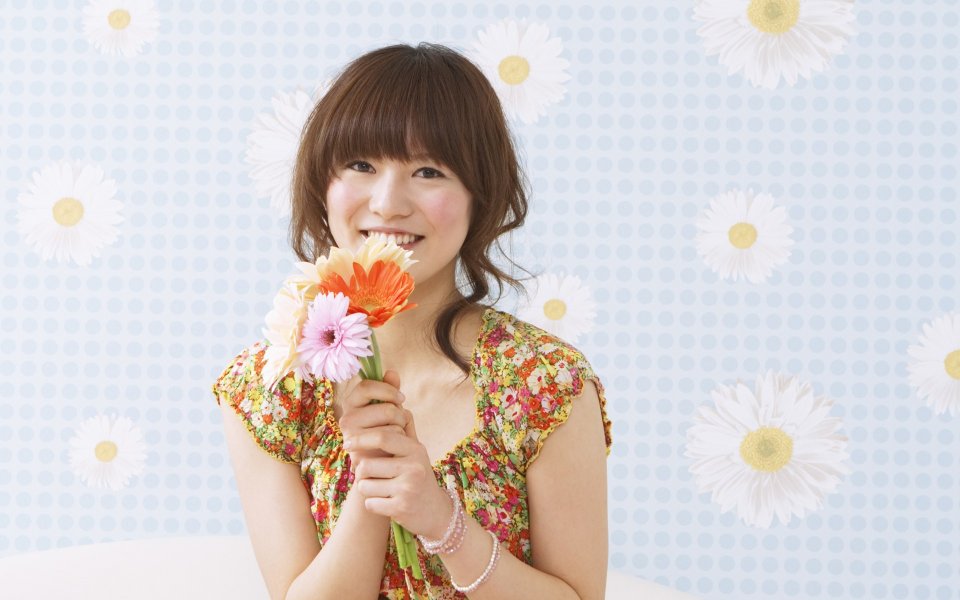 Sweet Japanese Girl Holding Gerbera At Home Portrait