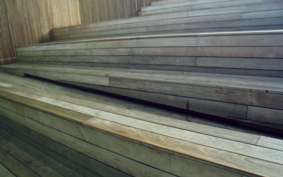 Low Angle Shot Of Wooden Indoor Stair Bleachers
