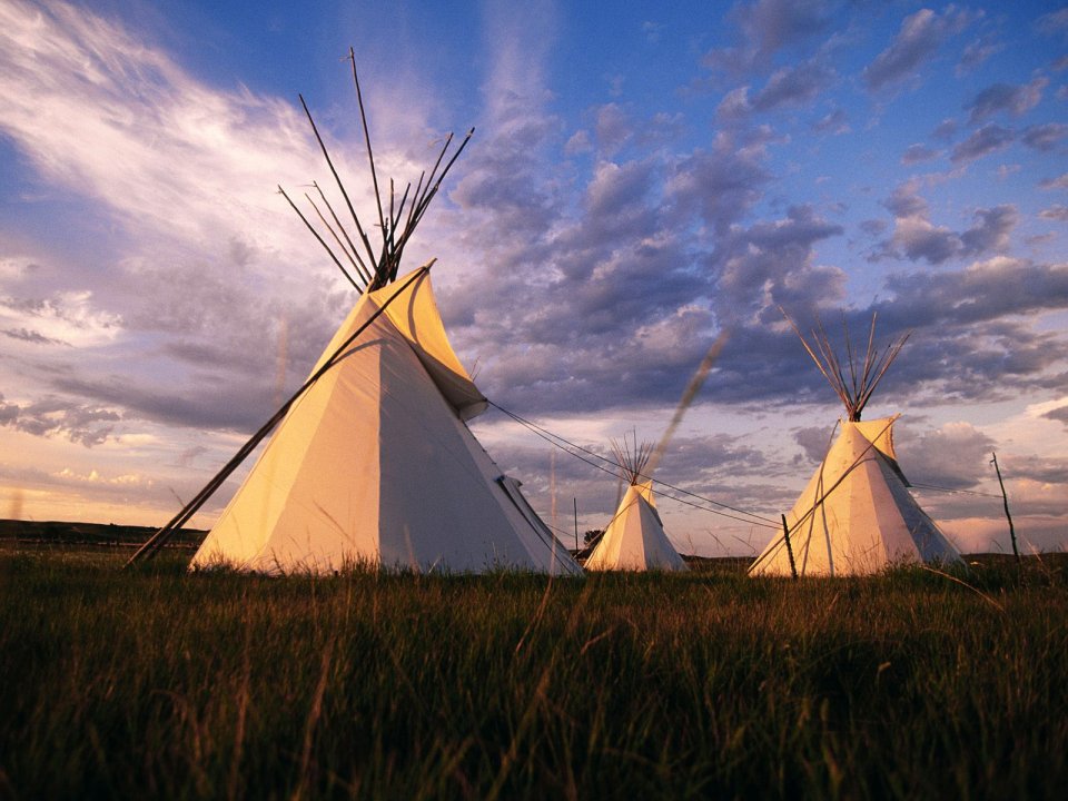 Sioux Teepees At Sunset South Dakota Grassland