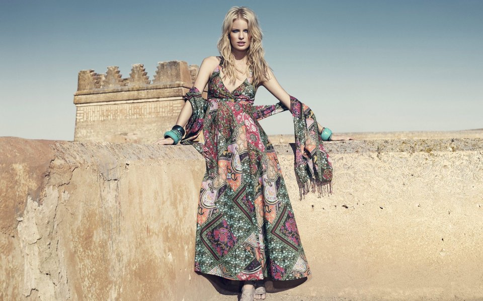 Bohemian Style Fashion Model Posing At Morocco Desert Ruins