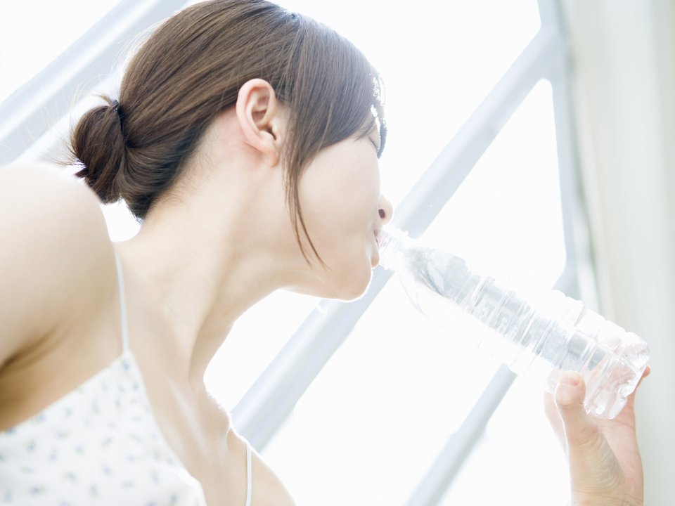 Young Girl Drinking Water By Bright Window Relaxing Home Lifestyle