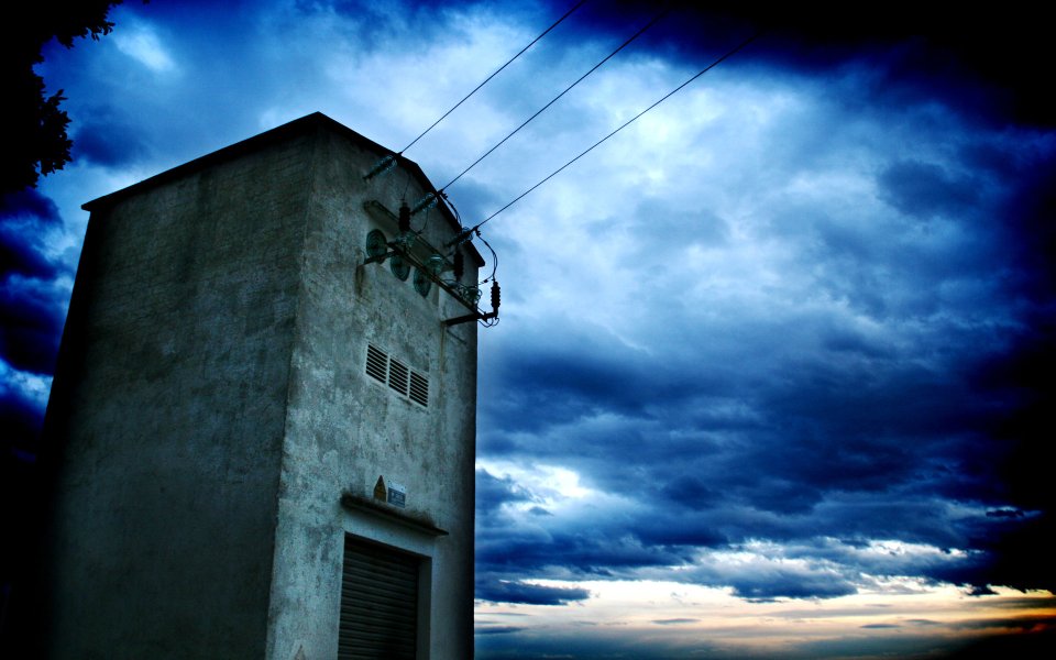 Old Substation Under Dark Storm Clouds At Dusk Hdr Photography