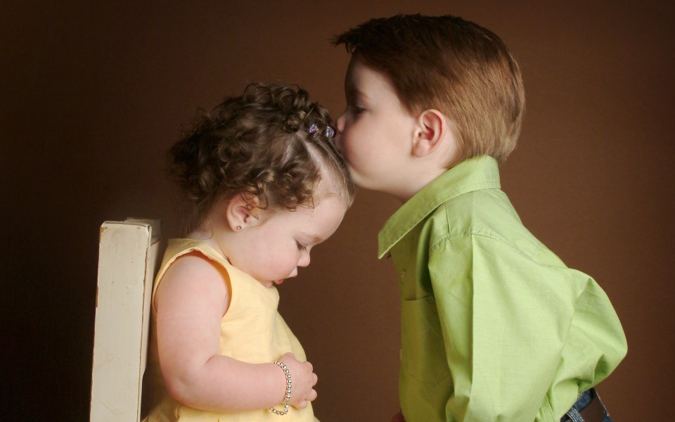 Little Boy Kissing Little Girl Forehead Warm Children Portrait