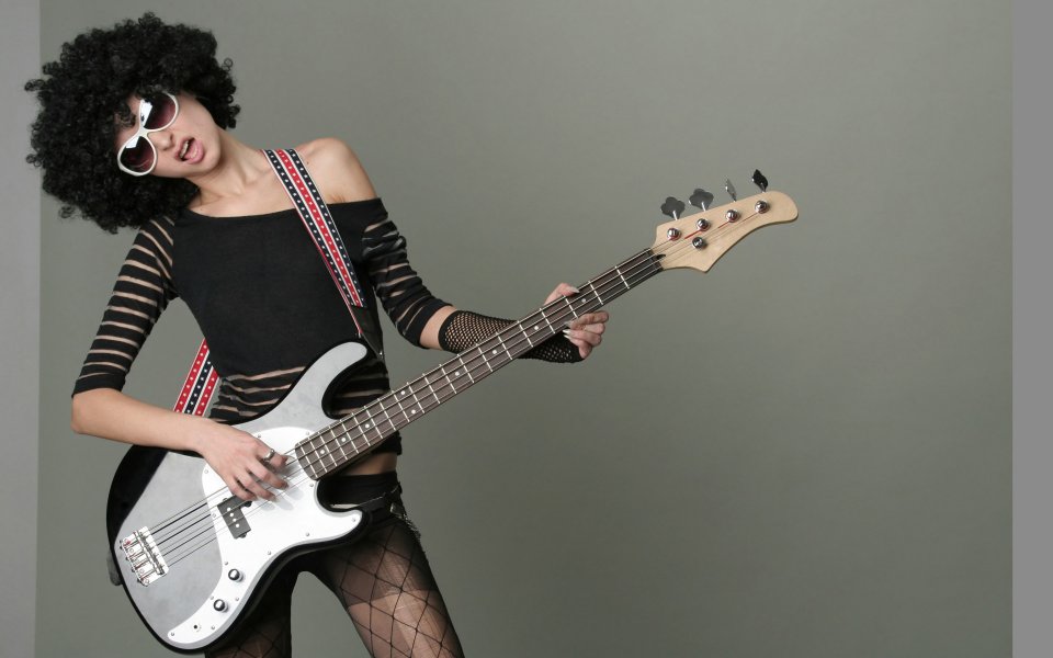 Rock Girl Playing Electric Bass Fashion Portrait