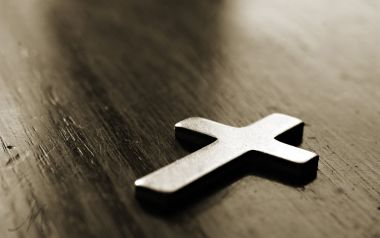 Vintage Metal Cross On Wooden Surface Macro Photography