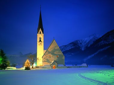 Snowy Church In Austrian Alps At Night