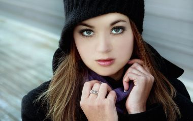 Winter Portrait Of Green Eyed Woman In Black Knit Hat