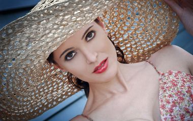 Elegant Red Lip Woman With Wide Brim Straw Hat Portrait
