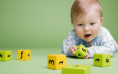 Cute Baby Playing With Alphabet Blocks Early Education Photo