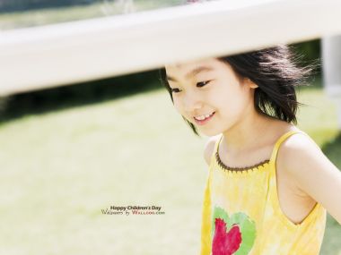 Smiling Asian Little Girl Outdoor Lawn Childrens Day Photo