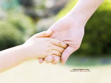 Parent Child Holding Hands Outdoor Childrens Day Photo