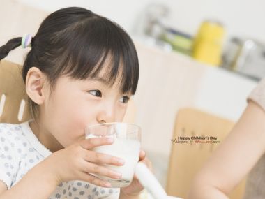 Cute Asian Little Girl Drinking Milk Children Day Photo