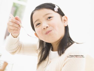 Cute Asian Little Girl Holding Spoon Childrens Day Warm Home Photo