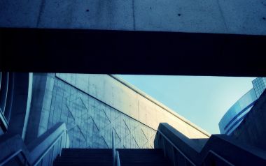 Low Angle Blue Tone Shot Of Modern Concrete Staircase Architecture