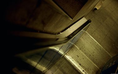 Low Angle Closeup Of Vintage Warm Toned Old Escalator
