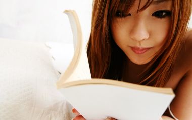 Japanese Idol Girl Reading At Home Portrait Photo