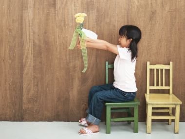 Little Girl Offering Yellow Carnation Warm Home Photo