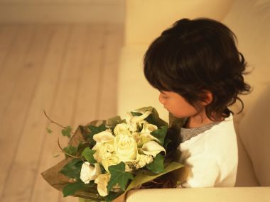 Warm Home Little Girl Holding White Flower Bouquet