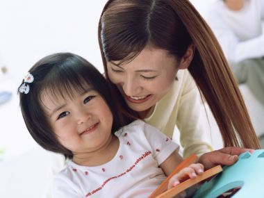 Cozy Mother Daughter Playing Toy At Home Family Moment