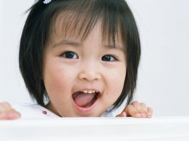 Happy Laughing Cute Little Asian Girl Portrait