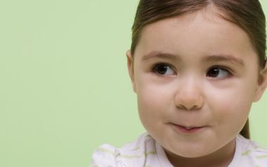 Cute Little Girl Child Portrait Photo On Light Green Background