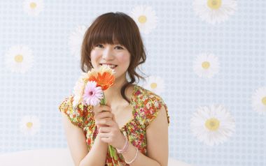 Sweet Japanese Girl Holding Gerbera At Home Portrait