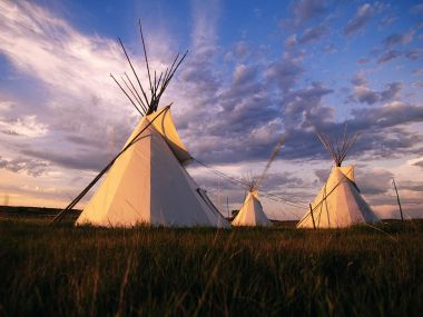 Sioux Teepees At Sunset South Dakota Grassland