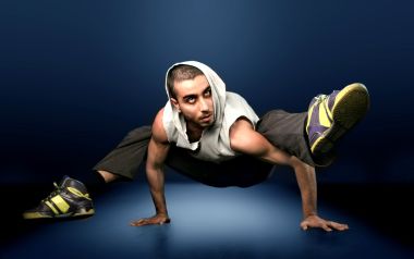Breakdancer Performing High Difficulty Bboy Move Studio Portrait