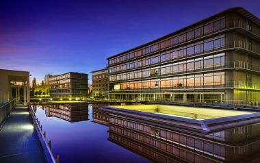 Germany Saarbrucken Modern Business Park Dusk Waterscape