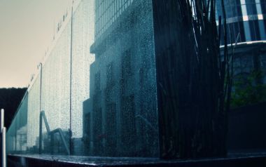 Rainy Urban Glass Water Wall Scenery