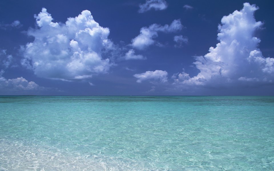 Okinawa Beach With Clear Turquoise Water And Blue Sky