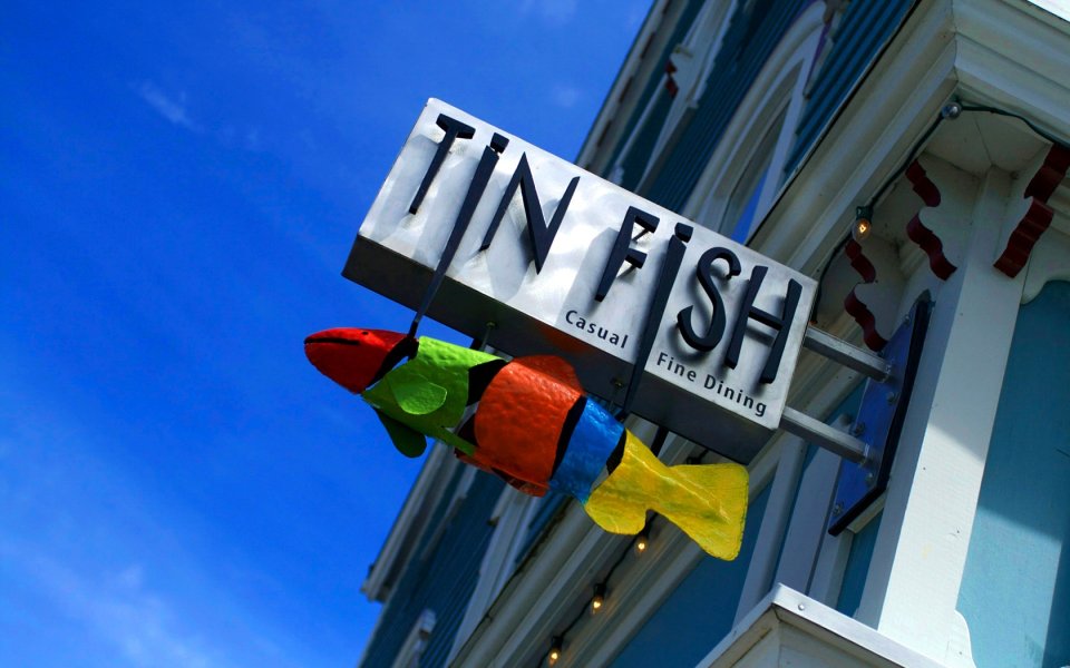 Tin Fish Restaurant Sign And Colorful Fish Decoration