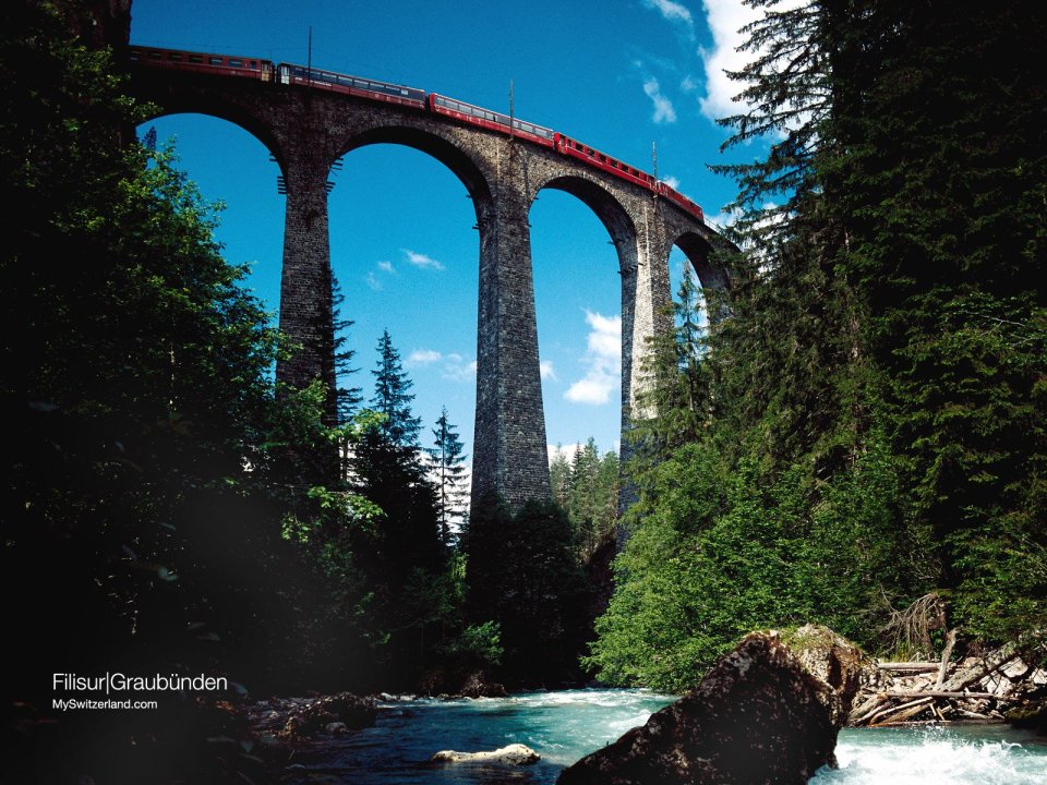 Switzerland Filisur Stone Arch Bridge And Red Train
